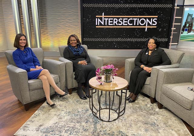 Dean Dr. Gretchen Generett smiling with other guests on set for KDKA's Intersections tv program